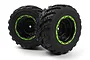 Two BlackZon 1.9 inch monster truck tyres pre-glued onto black wheels with bright green beadlock-style rings, set against a white background.