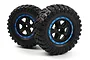 Two BlackZon 1.9 inch RC desert truck wheels with black spoked rims, blue beadlock-style rings, and aggressive treaded rubber tires.