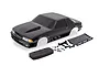 A black Traxxas Ford Mustang Fox body shell for a 1/10 scale Drag Slash RC car, including a rear wing, foam bumper, side mirrors, and mounting hardware.