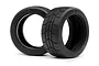 Two black HPI Racing 2.2-inch Gymkhana D compound RC tyres with tread patterns, shown against a white background.