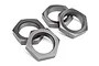 Four gunmetal grey serrated aluminium wheel nuts for RC vehicles arranged on a white background.