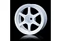 A single white six-spoke RC car rim against a black background.