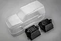 An unpainted clear polycarbonate RC crawler body shell by MST, accompanied by two black plastic inner fender liners on a grey background.