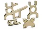 A set of four gold-anodized aluminium RC car parts including motor mounts and differential supports.
