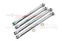 Four silver GPM Racing aluminium lower chassis linkages for RC cars, arranged diagonally with two small metal washers.