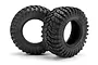 Two HPI Racing Maxxis Trepador RC short course tyres with aggressive tread patterns, shown against a white background.
