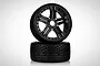 Two Jetko 1/8 scale RC buggy wheels with black Claw rims and Hot Dot tread pattern tyres stacked on a white background.