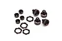 A set of dark brown anodized aluminium RC shock absorber parts including caps, collars, and small washers on a white background.