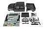 Team Associated Knightrunner painted RC truck body set including cabin, bed, decal sheet, and plastic accessory parts on a white background.