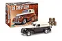 A Revell 1/24 scale 1939 Chevy Sedan Delivery plastic model kit box and the assembled model car with miniature wooden barrels.