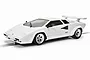 A white Scalextric 1/32 scale Lamborghini Countach slot car on a track against a white background.