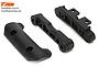 Three black plastic RC car suspension components from Team Magic, including a curved mount and two structural arm mounts.