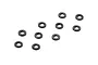 Ten small black circular aluminium shims arranged on a white background.