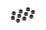 A set of ten small black cylindrical aluminium shims arranged on a white background.