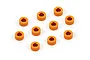 Ten small orange anodized aluminium cylindrical shims or spacers arranged on a white background.