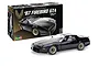 A Revell 1/16 scale 1987 Pontiac Firebird GTA plastic model kit box next to a fully assembled and painted black model car.