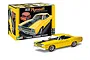 A Revell 1/24 scale 1970 Plymouth Roadrunner plastic model kit box next to a fully assembled and painted yellow model car.