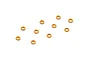 Ten small orange anodized aluminium shims arranged on a white background.