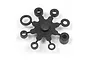 A black plastic parts tree containing various circular shims and spacers for RC cars, isolated on a white background.