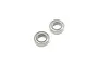 Two silver metal ball bearings shown from a top-down angle against a plain white background.