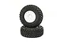 Two Losi RC crawler wheels with white Method rims and black Falken Wildpeak M/T tires stacked on a white background.