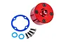 A red anodized aluminium differential case for Traxxas RC cars, shown with a blue gasket, two blue O-rings, and four black screws on a white background.