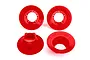 Four bright red Traxxas wheel covers for RC vehicles, shown from different angles on a white background.