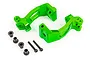 Two bright green anodized aluminium C-hub carriers for Traxxas RC vehicles, accompanied by four small bushings and two black metal screws.