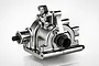 A silver-coloured CNC machined aluminium rear gearbox assembly for an RC vehicle, shown against a plain white background.