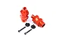 Two red anodized aluminium front wheel extensions for RC cars, with two black plastic caps and two metal bolts on a white background.