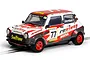 A 1/32 scale Scalextric Mini Miglia slot car featuring the JRT Racing Team livery with number 77 and Revive branding on a white and grey body.