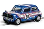 A 1/32 scale Scalextric Mini 1275GT slot car in blue and white Patrick Motorsport livery with number 60 on the side.