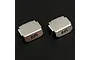Two stainless steel differential skid plates for RC cars, featuring the Yeah Racing logo, displayed on a black background.