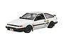 A completed 1/24 scale plastic model kit of a white Toyota AE86 Trueno with racing decals and dark grey wheels.