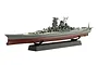 A 1/700 scale plastic model of the IJN Battleship Yamato on a black display stand against a white background.