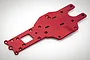 A red anodized aluminium rear chassis plate for an RC car, featuring multiple mounting holes and cutouts, isolated on a white background.