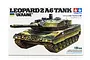 Tamiya 1/35 scale Leopard 2 A6 Tank Ukraine model kit box art showing a detailed illustration of the tank with white cross markings.