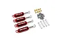 Four red aluminium internal shock absorbers by Yeah Racing with included brass bushings, black O-rings, and silver coil springs on a white background.