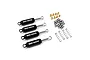 A set of four black Yeah Racing internal RC shock absorbers with mounting hardware, O-rings, and springs on a white background.