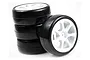 A set of four Team Powers 1/10 scale touring car slick tyres mounted on white multi-spoke plastic rims.