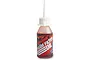 A bottle of Traxxas foam filter oil with a white applicator cap against a white background.