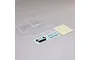 An unpainted clear polycarbonate RC crawler body shell with two decal sheets and a mask sheet on a plain grey background.