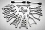 A complete Rovan silver aluminium front and rear suspension upgrade kit for RC cars, featuring various arms, shafts, and mounting hardware on a white background.