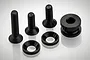 A set of black RC engine chassis fixing screws, washers, and a spacer on a white background.