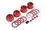 A set of four red aluminium 5-star beadlock rims for 1/5 scale RC cars, including beadlock rings, hub caps, and mounting screws.