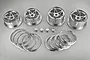 A set of four silver aluminium 5-star beadlock rims for 1/5 scale RC cars, including beadlock rings and center caps, arranged on a grey background.