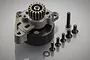 Rovan metal 17T tripod clutch cup kit with integrated gear and included mounting screws on a grey background.