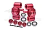 A pair of red anodized aluminium RC steering hubs by GPM Racing, including bearings, screws, and spacers on a white background.