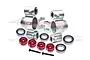 A pair of silver aluminium GPM Racing hub carriers with red spacers, bearings, and screws on a white background.