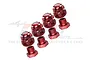A set of red anodized aluminium wheel hexes and locking nuts for RC cars, featuring GPM branding and 7075 alloy markings.